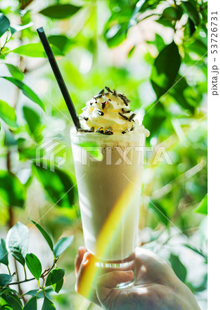 summer milk cocktail with whipped cream 53726731
