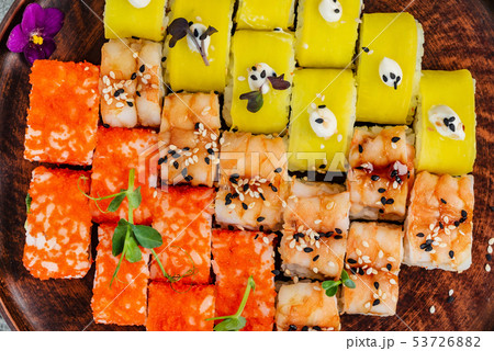 Rainbow Sushi Roll with salmon, eel, tuna, avocado, royal prawn, cream cheese Philadelphia, caviar tobica, chuka. Sushi menu. Japanese food Rainbow Sushi Roll with salmon, eel, tuna, avocado, royal prawn, cream cheese Philadelphia, caviar tobica, chuka. Sushi menu. Japanese food 53726882