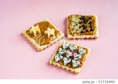Delicious Toast with peanut butter on the pink background 53726883