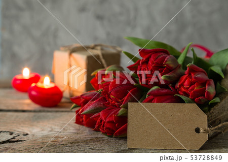 Valentine's day concept - flowers and present Valentine's day concept - flowers and present 53728849