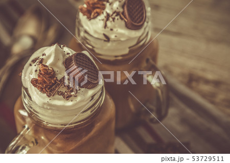 Cold coffee drink in glass jar 53729511