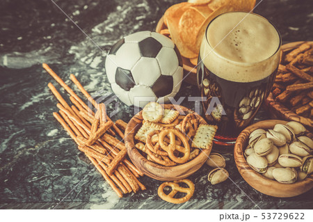 Selection of party food for watching football championship Selection of party food for watching football championship 53729622