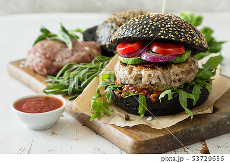 Black burger and ingredients 53729636