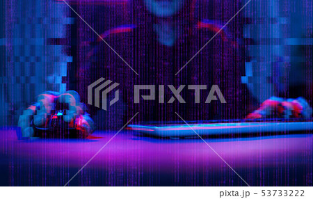 Hacker working with computer in dark room with digital interface around. Image with glitch effect. Hacker working with computer in dark room with digital interface around. Image with glitch effect. 53733222