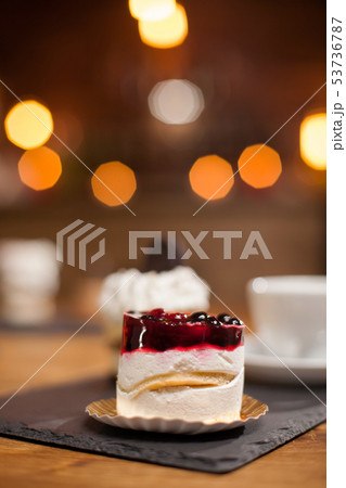 Tasty and delicious cake with fruits on top 53736787