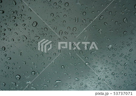blur backgruond,Rain water on the car glass. blur backgruond,Rain water on the car glass. 53737071