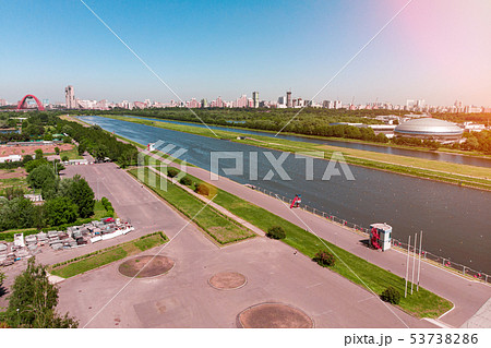 Rowing canal illuminated by bright sunshine. Panoramic view. Shooting from above, aerial filming 53738286