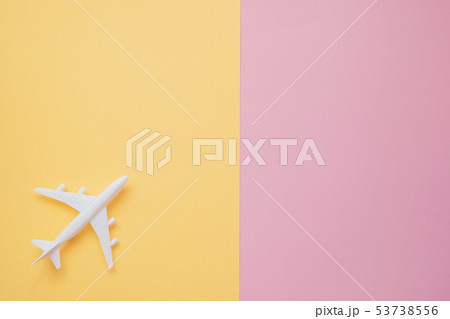 Plane on yellow and pink background  53738556
