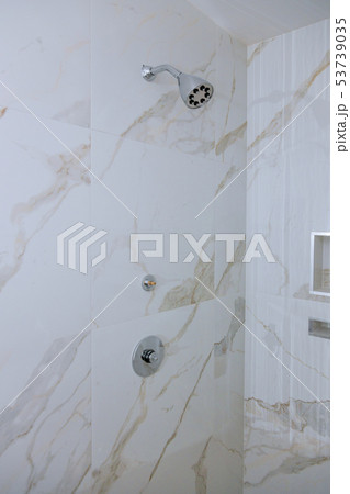 Detail of a corner shower cabin with wall mount Detail of a corner shower cabin with wall mount 53739035