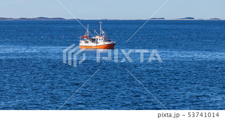 Small orange white fishing boat Small orange white fishing boat 53741014