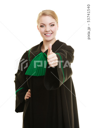 Woman lawyer making ok sign thumb up hand sign Woman lawyer making ok sign thumb up hand sign 53741540