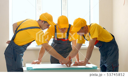 Engineers of building company create the future project. Engineers of building company create the future project. 53745852