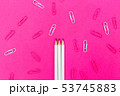 White pencil on a pink background 53745883