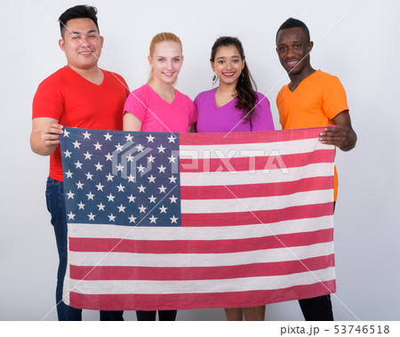 Studio shot of happy diverse group of multi ethnic friends smili Studio shot of happy diverse group of multi ethnic friends smili 53746518