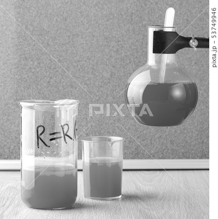 The old style test tubes and glass bottle in 53749946