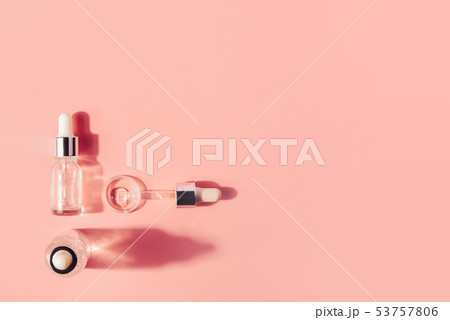 Hyaluronic acid, botulin, serum in vials. Concept of cosmetic surgery for facial rejuvenation. Hyaluronic acid, botulin, serum in vials. Concept of cosmetic surgery for facial rejuvenation. 53757806