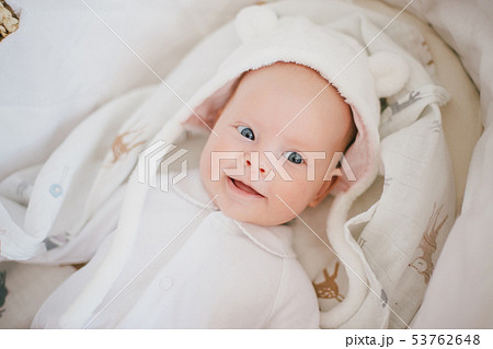 Baby in a straw basket 53762648