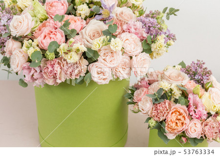Two Beautiful spring bouquets in head box. Arrangement with mix flowers. The concept of a flower Two Beautiful spring bouquets in head box. Arrangement with mix flowers. The concept of a flower 53763334