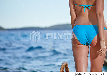 Sexy Woman Back On Sea Background 53765671