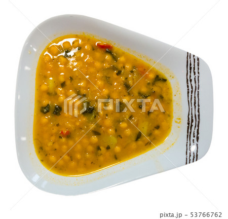 Garbanzo bean soup on a white plate Garbanzo bean soup on a white plate 53766762