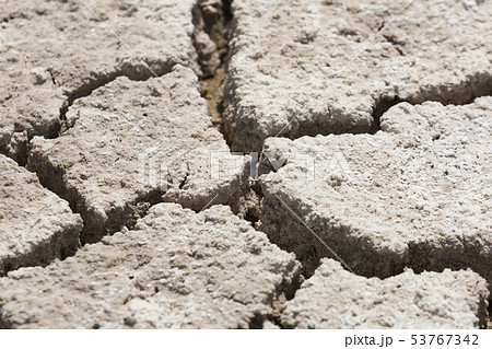 Close-up of cracked earth on arid area without plants at day 53767342