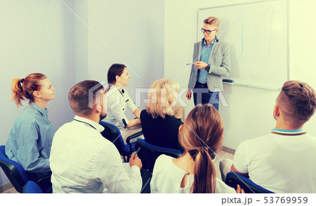 Group of glad students at extension courses Group of glad students at extension courses 53769959