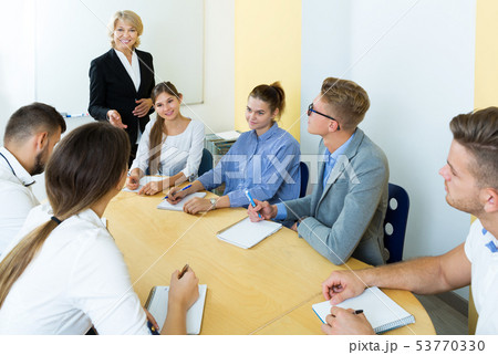 group of students listening teacher group of students listening teacher 53770330