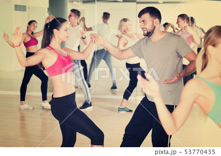 People dancing at dance class 53770435