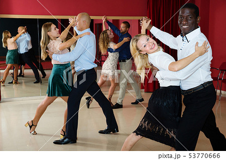 Couples enjoying foxtrot Couples enjoying foxtrot 53770666