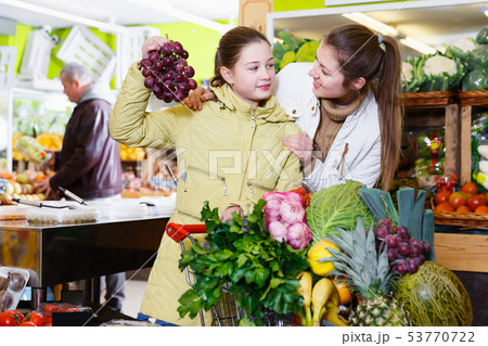 Portrait of smiling mother with daughter 53770722