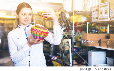 woman is looking on home decorations 53773653