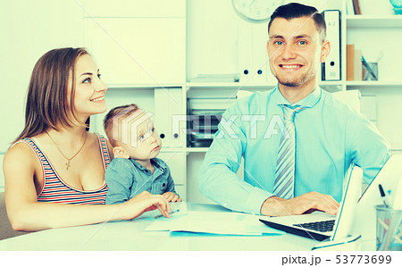 manager of insurance company talking with female 53773699