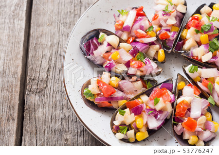 Traditional  Peruvian food background with mussels 53776247