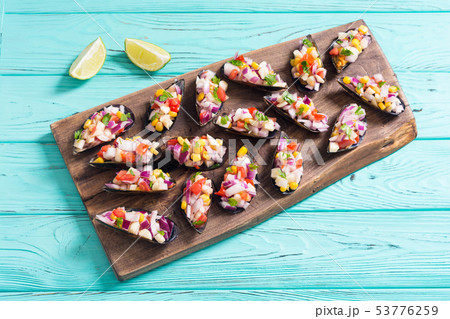 Traditional  Peruvian food background with mussels 53776259