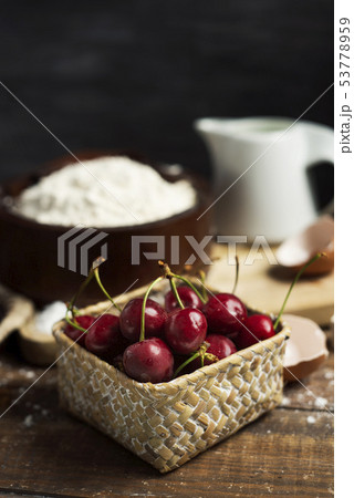 ingredients for a coca de cireres, a cherry cake 53778959