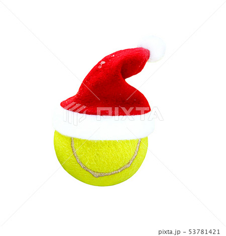 Santa hat on tennis ball on white background. Merry Christmas and Happy New year concept with tennis Santa hat on tennis ball on white background. Merry Christmas and Happy New year concept with tennis 53781421
