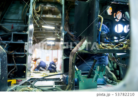 Mi-8 helicopter during maintencance and repair Mi-8 helicopter during maintencance and repair 53782210