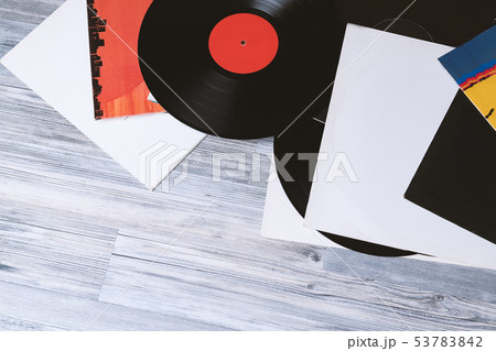 Black vinyl record on background Black vinyl record on background 53783842