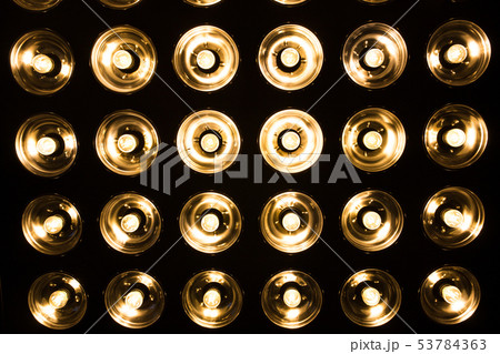 Vintage incandescent bulbs in retro style. Many lights in the form of a spotlight. Vintage incandescent bulbs in retro style. Many lights in the form of a spotlight. 53784363