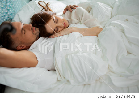 Romantic atmosphere of the woman sleeping with her husband 53784478