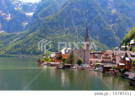 Famous Austria village Hallstatt with church 53785311