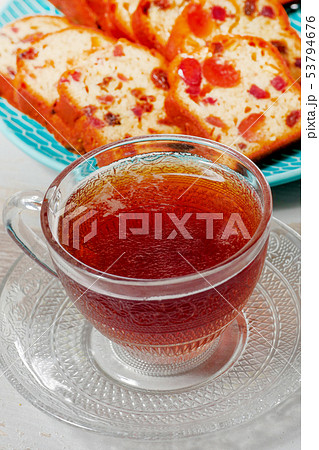 cup of tea with dried fruit cake 53794676