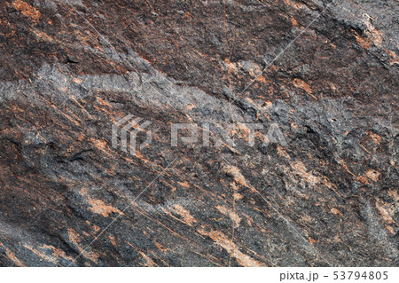 Natural dark gray and red stone background Natural dark gray and red stone background 53794805