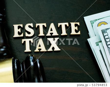 Estate tax from wooden letters and gavel. Estate tax from wooden letters and gavel. 53794853