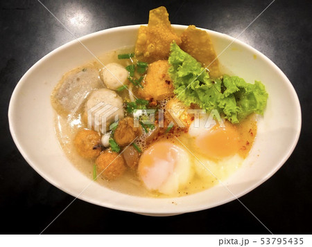 Tom Yum Pork noodle spicy soup with boiled egg 53795435