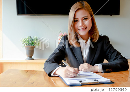 young woman sitting for candidate at job interview young woman sitting for candidate at job interview 53799349