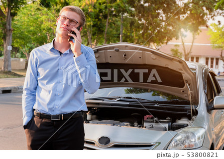 business man calling insurance agent after business man calling insurance agent after 53800821