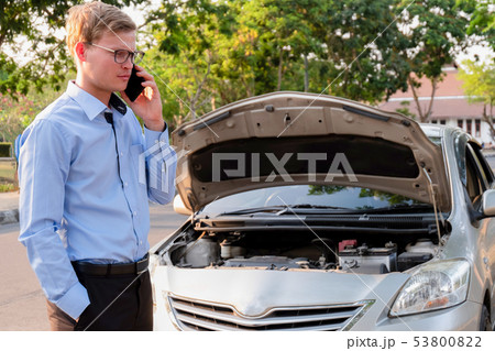 business man calling insurance agent after business man calling insurance agent after 53800822