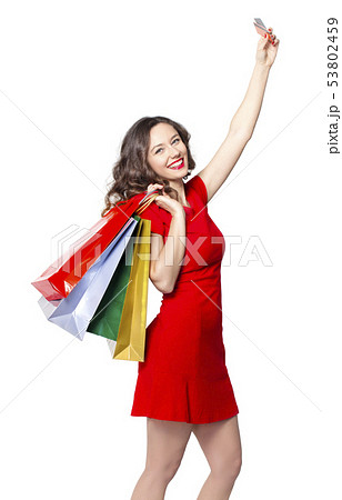 Young woman shopping Young woman shopping 53802459
