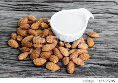 Almond milk and almonds Almond milk and almonds 53804295